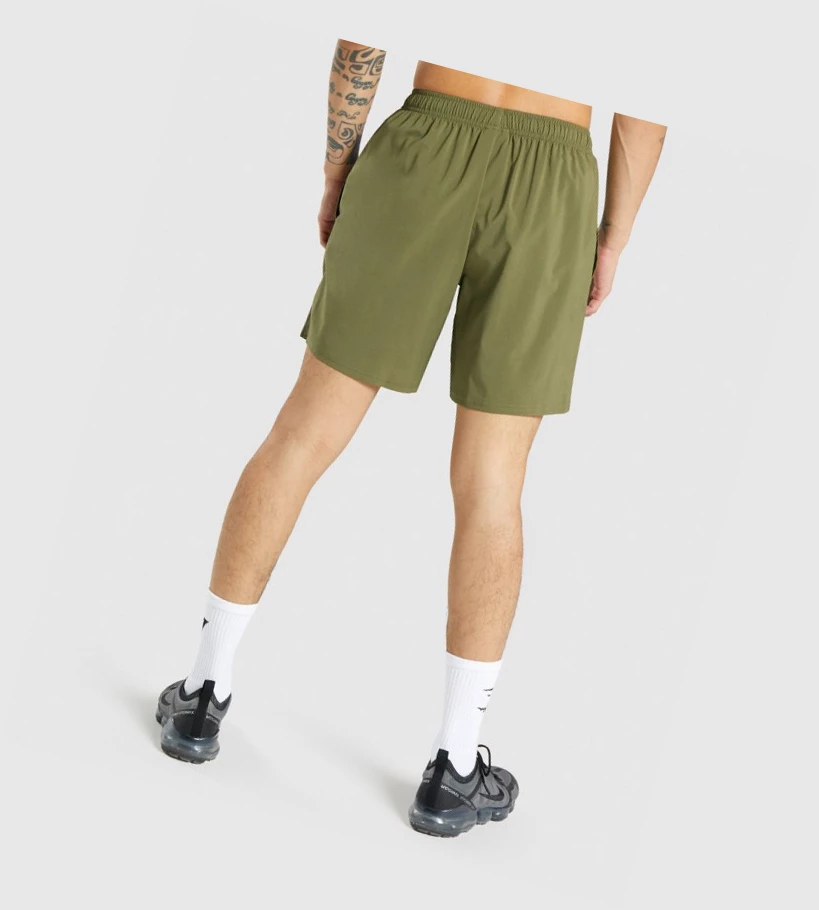 Gymshark Arrival Miesten Shortsit Tummanvihreä | NKGFMC792